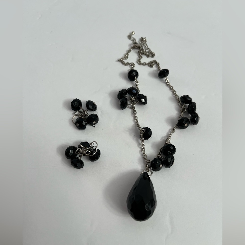 Elegant black beaded necklace and pierced earring dangle set.